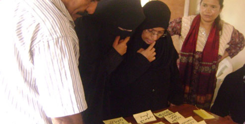 Comparing notes at a workshop in Aden