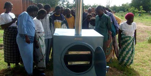 People standing beside bakery oven