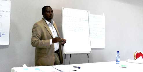 Mandlenkosi Mpofu making a presentation