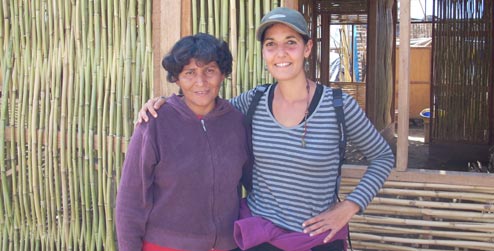 Maria Lacarra (right) with a community leader