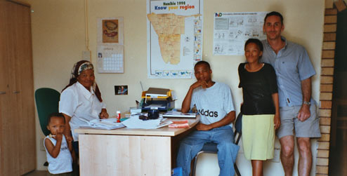 Former development worker Ian Askew, with friends and colleagues