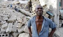 wilbert joseph surveys the rubble of his former home