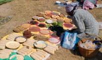 A woman selling produce at Chigondo market, Zimbabwe
