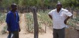 Development worker Cliff Maunze (right) with a farmer in Zimbabwe