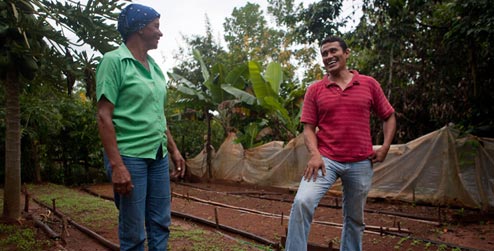 Amparo with Bernardo in food garden