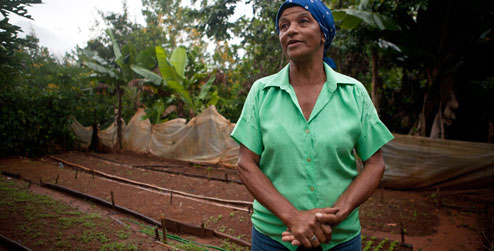 Amparo in her food garden