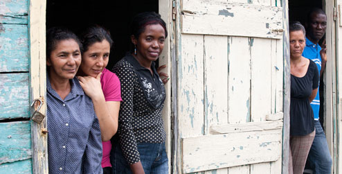 Development worker Karina Cuba and health promoters in Partido, DR