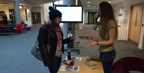 Sophie Elkins running a stall for her Action at Home