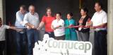 Cutting of the ribbon to open the new coffee factory.