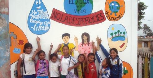 Children in front of mural