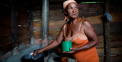 Ana Rita making tea on her stove