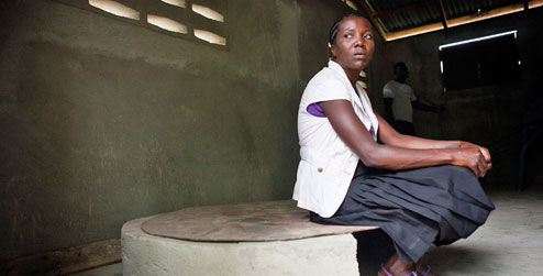 Luisanne in the cassava processing factory