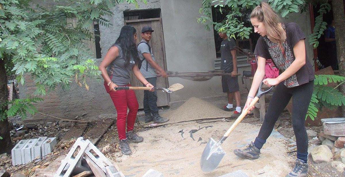 Volunteers working on eco-stoves