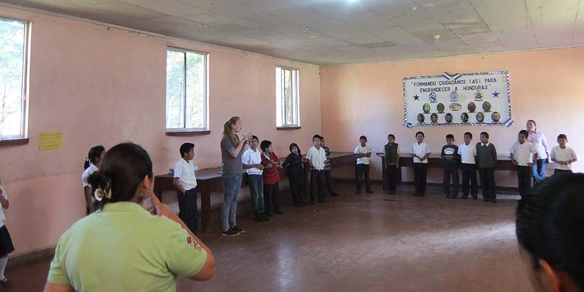  UK volunteer Laura making English lessons more fun with a game