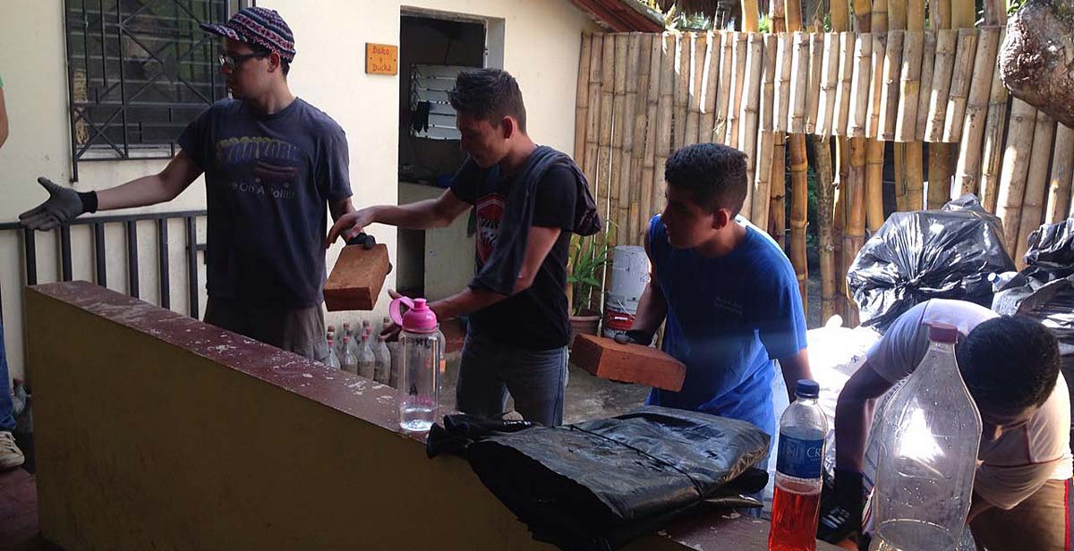 Volunteers recycling bottles