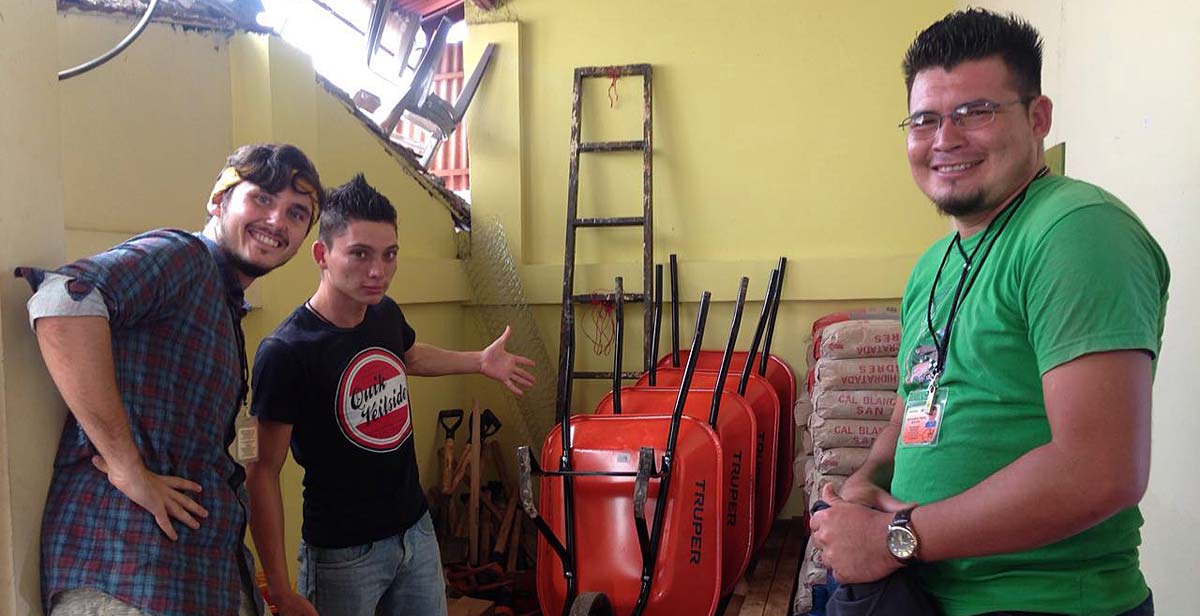 Volunteers with wheelbarrows