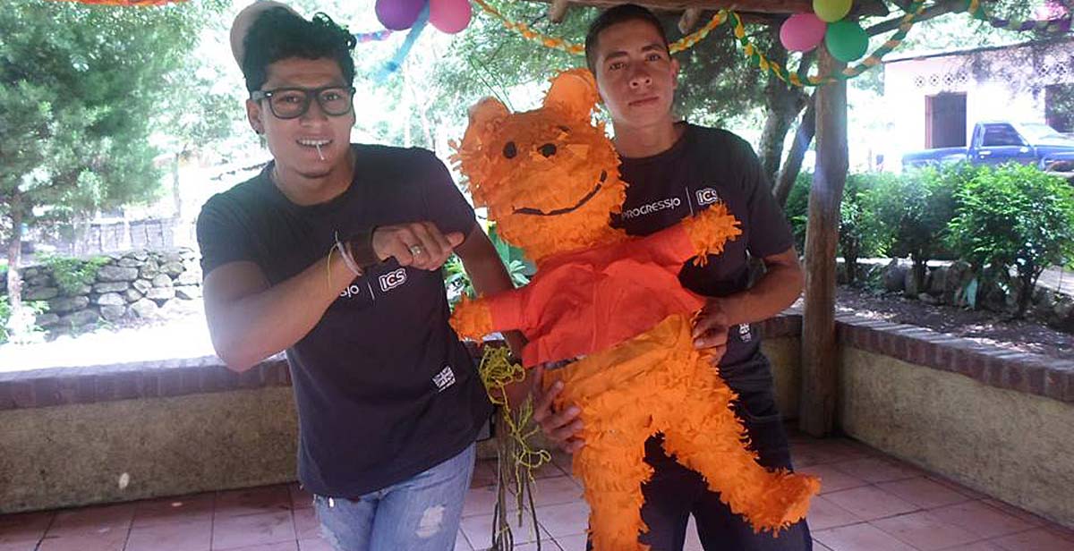 Volunteers with pinata