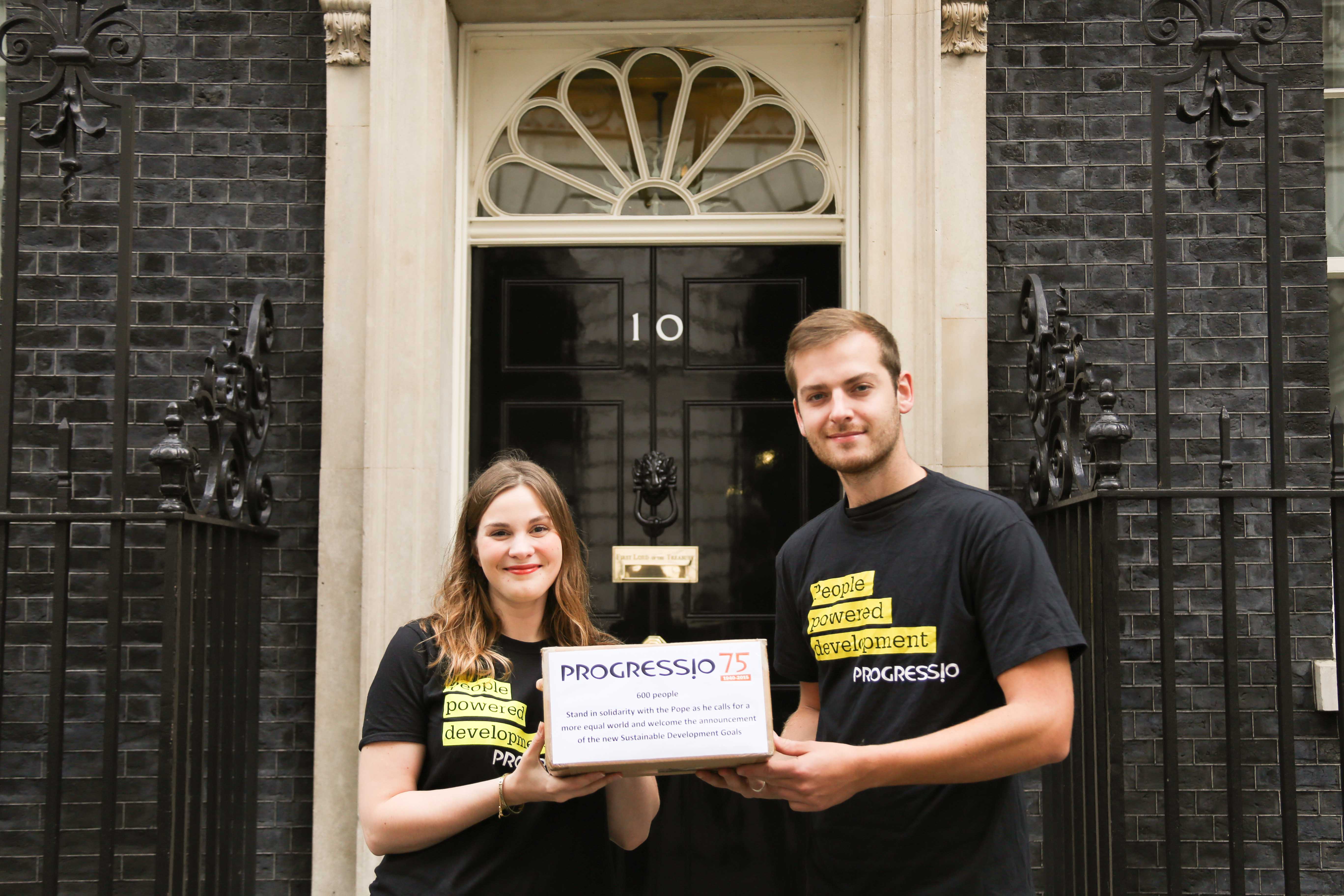 Campaigns Officer Jenny Vaughan and Action at Home Officer Seb Scott hand in petition to No 10