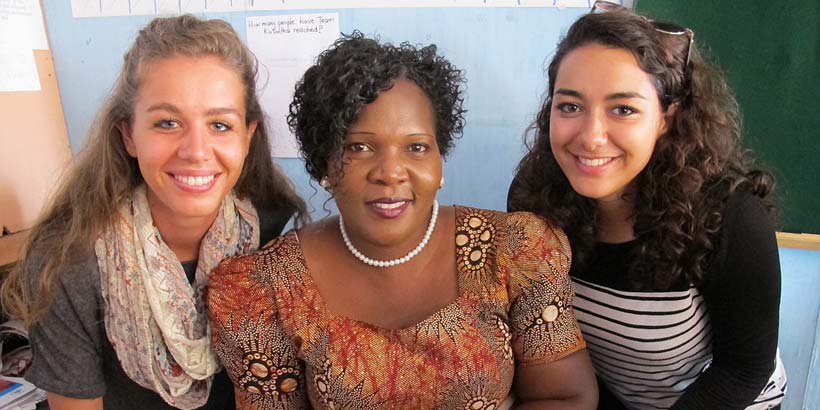 Kate and Ikram with their Amama (host mother) Mrs Gondwe after her public speaking talk