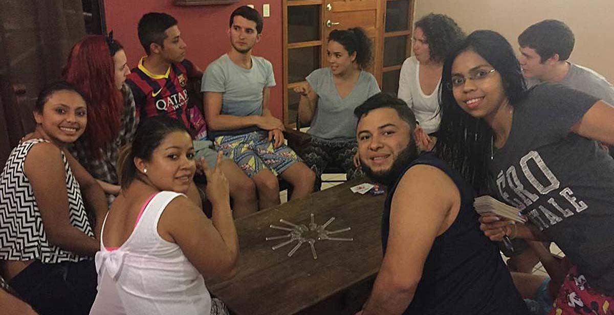 UK and national volunteers playing a game of spoons aka ‘cuchara’ during the orientation week. 