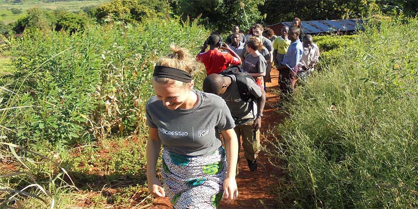 The ICS Volunteers and Youth members hiking to the tea field