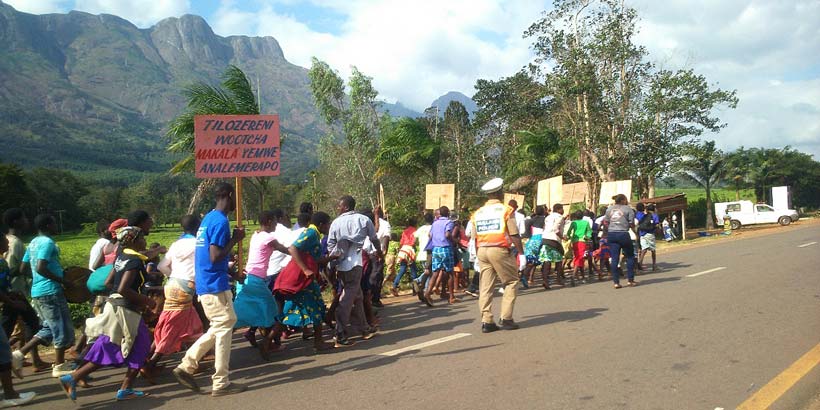 Schools, youth clubs and Mulanje community members join together for the procession across Mulanje