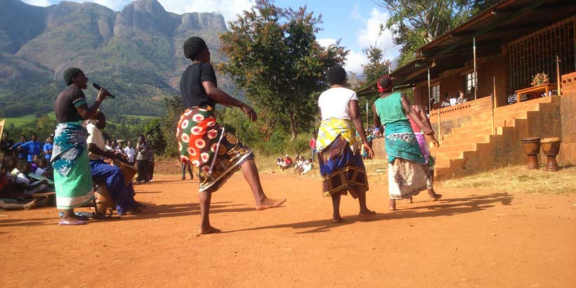 Participants being entertained by Malawi’s traditional dancers