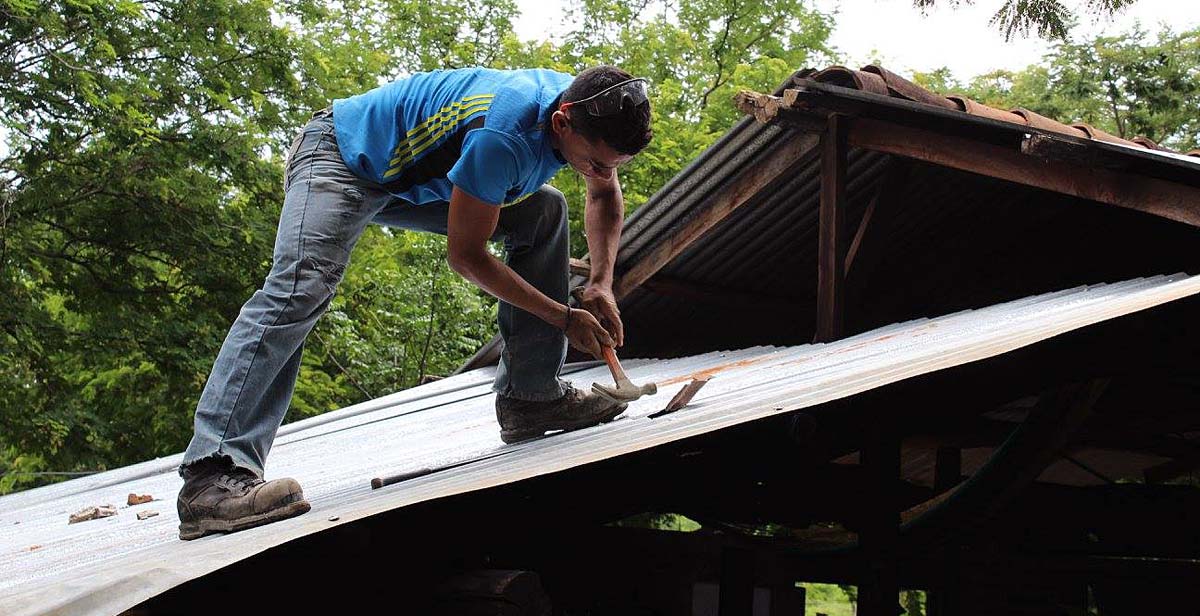 Working on an eco-stove chimney