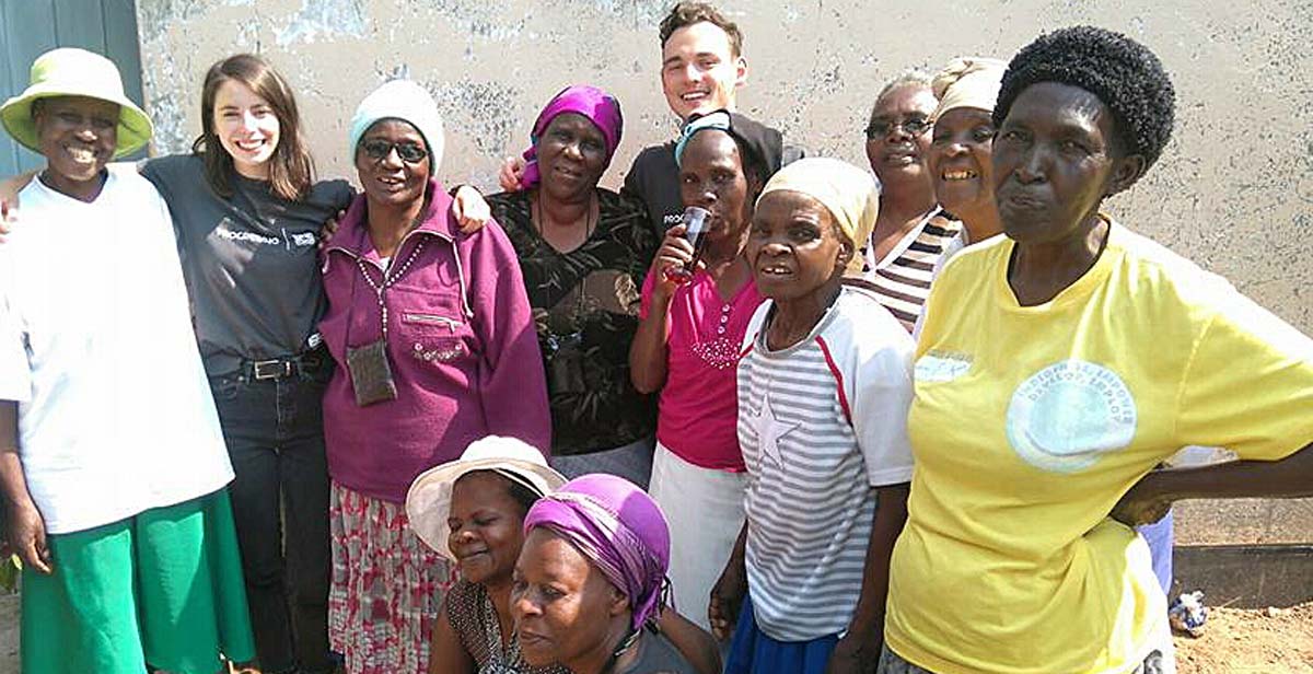 James and Katie pose for a picture with grannies after the IGA workshop