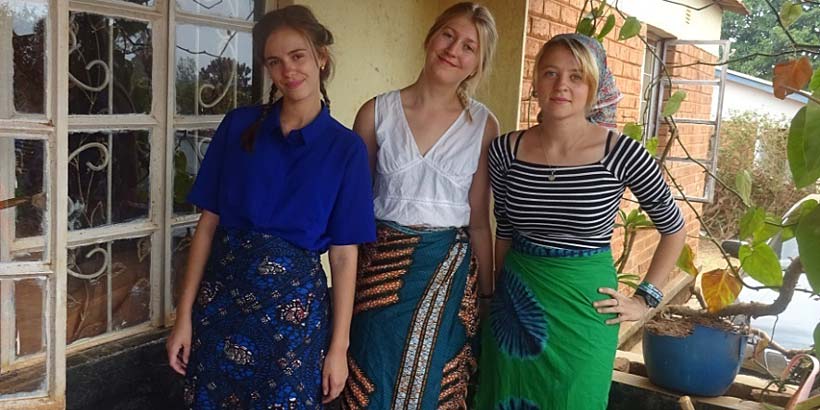 Anna, Ellie and Kitty wear chitenje, a skirt worn by all Malawian women