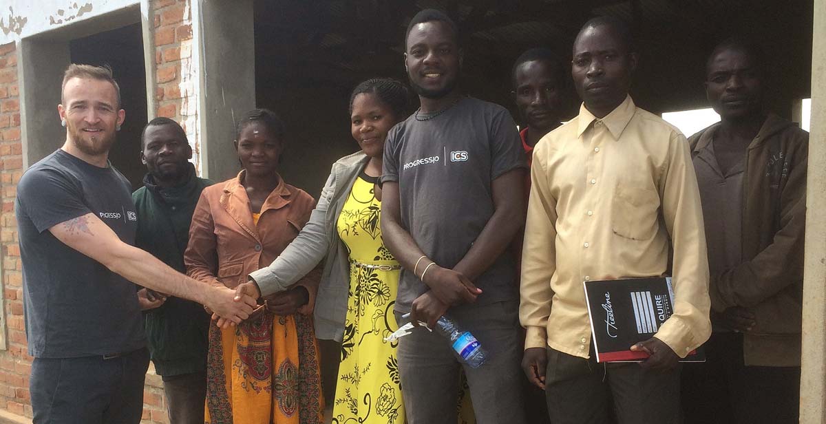 Shaking hands with community leaders and Chiefs