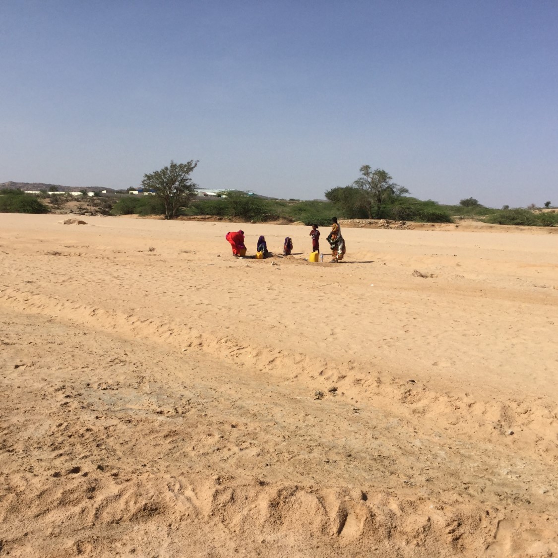 Women in a dried up river bed, Somaliland. Photo by Malou Schueller