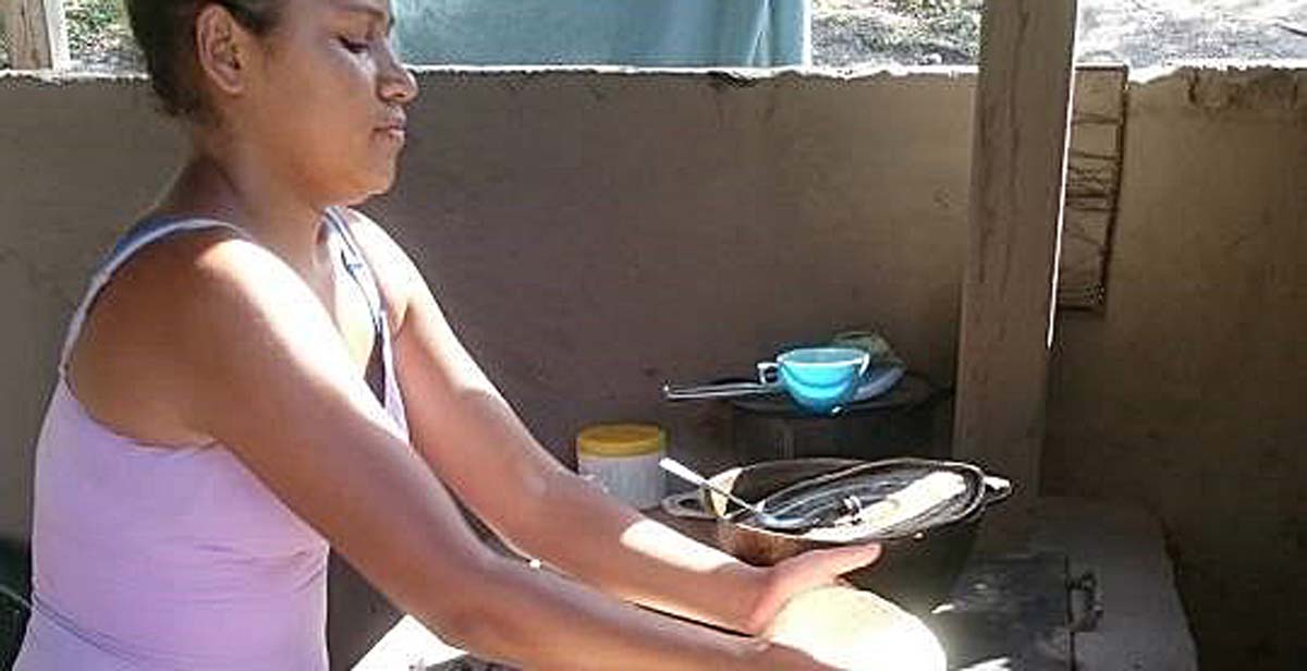 Sandra making tortillas on a new eco-stove