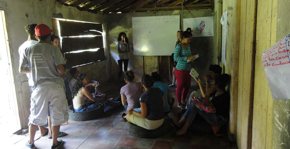 Volunteers giving an English class