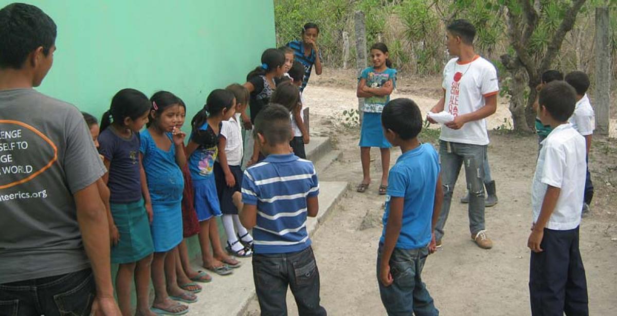 An English lesson supported by two national ICS volunteers