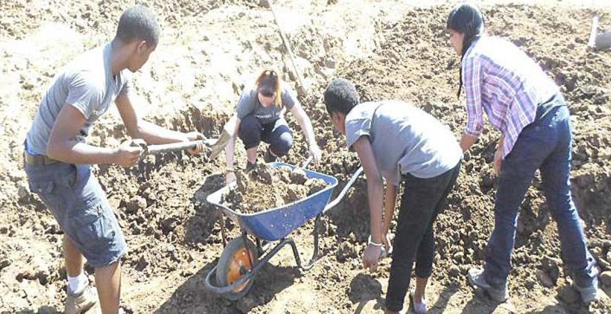 Digging a community fish pond