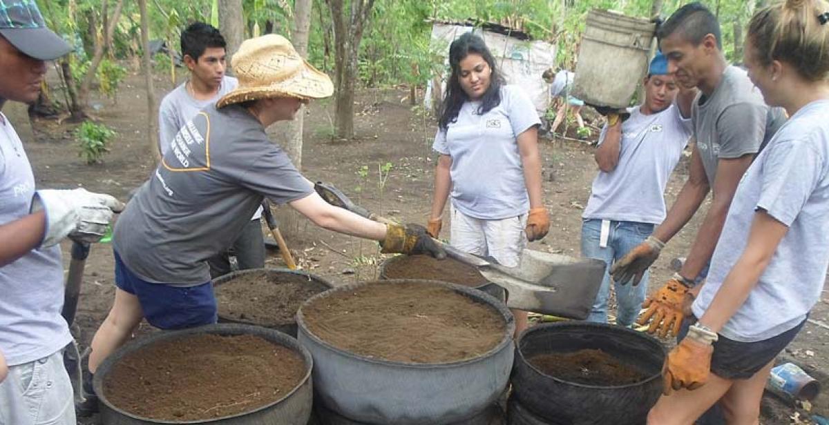 Volunteers building vegetable patches