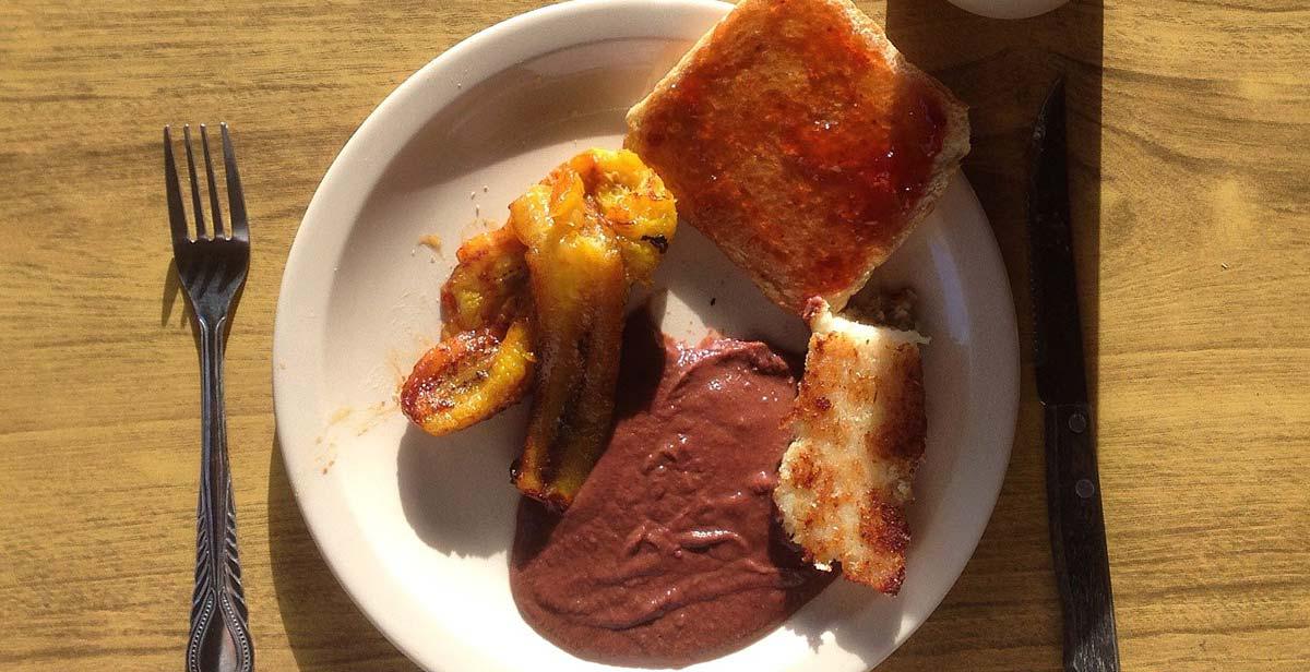 Breakfast - plantain, toast, frijoles and tamalito de elote