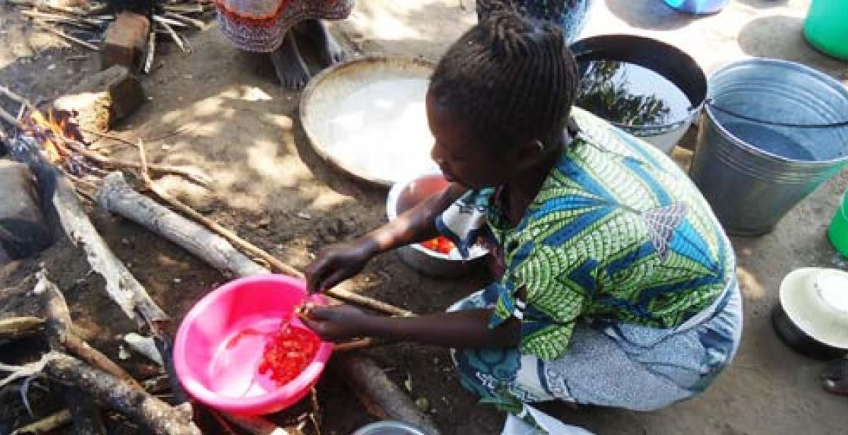 A woman preparing food in Malawi