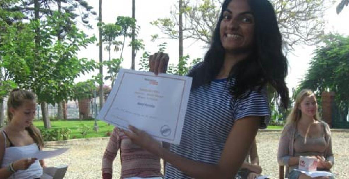 Progressio ICS volunteers hold certificates