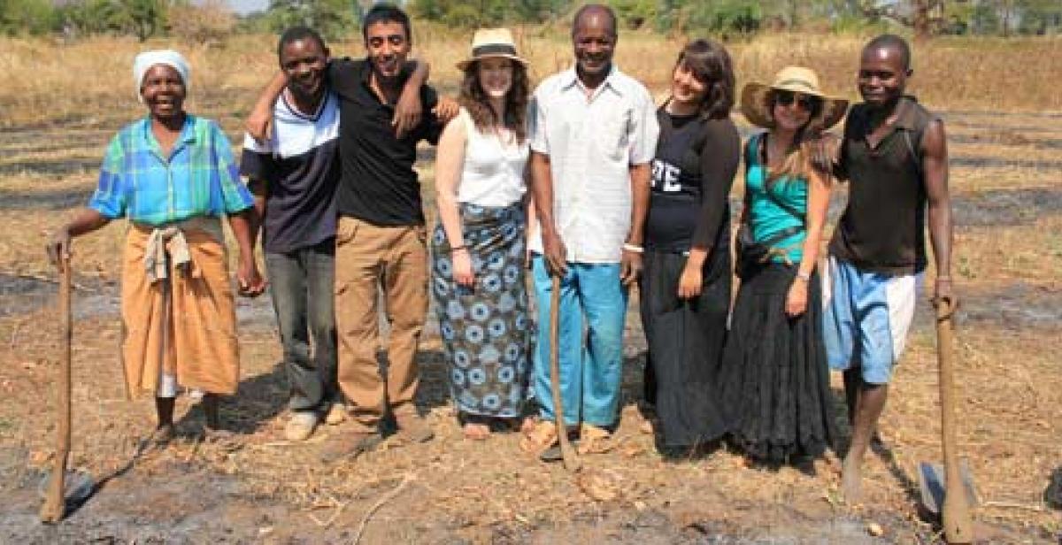 Volunteers with Chief Bandu, his mother and another villager