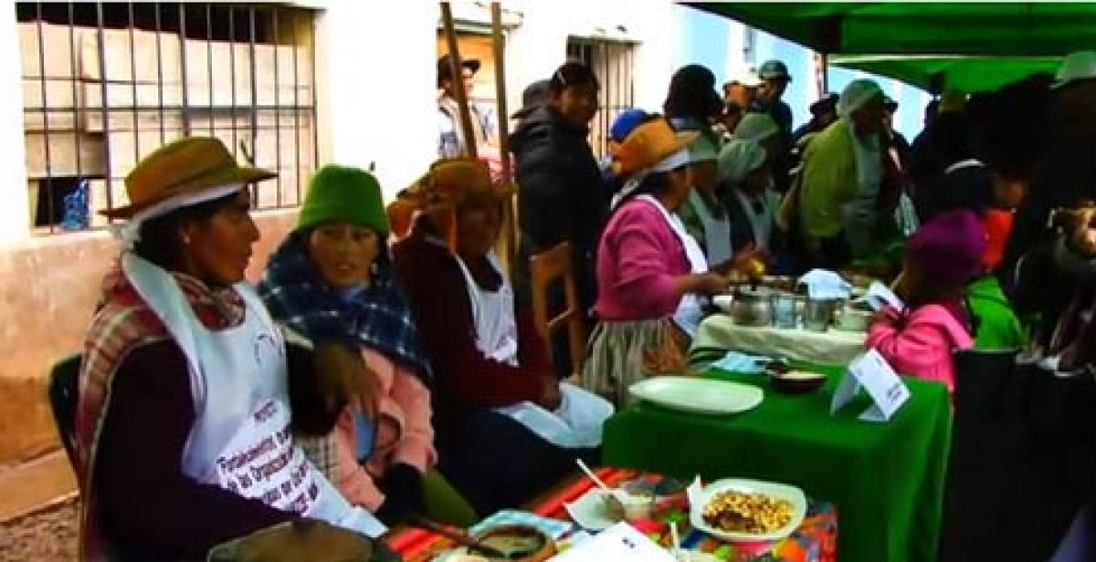 Women at a food fair in Huancavelica, Peru