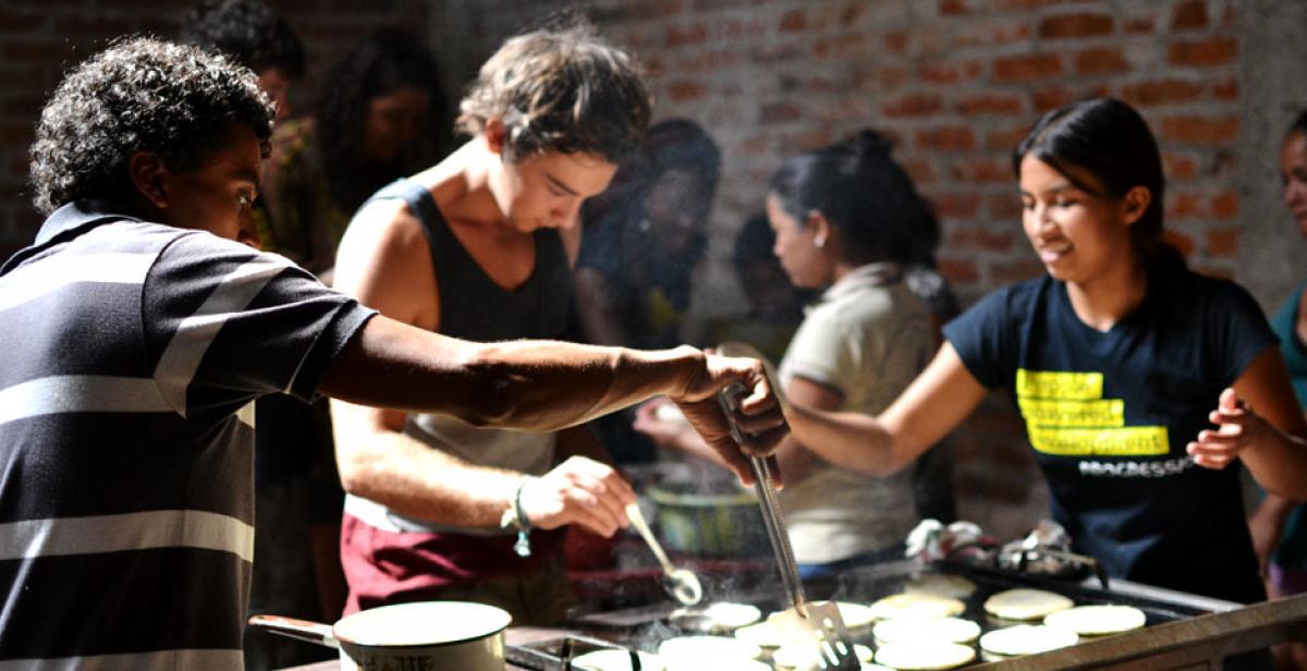 Volunteers supporting community cooking workshop