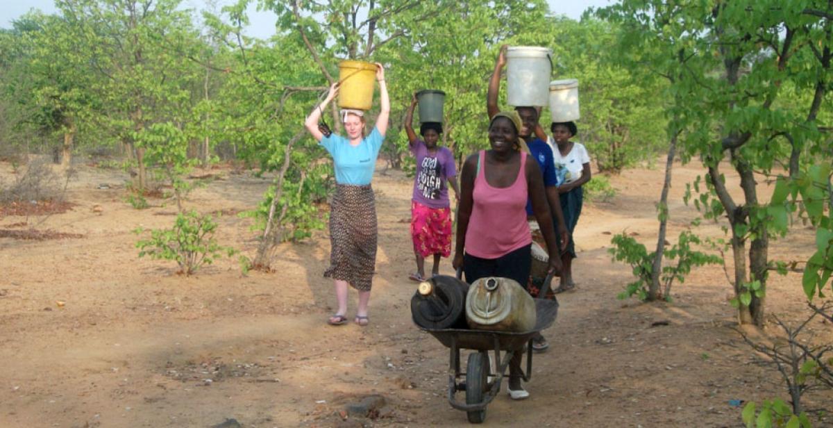 Volunteers collecting water