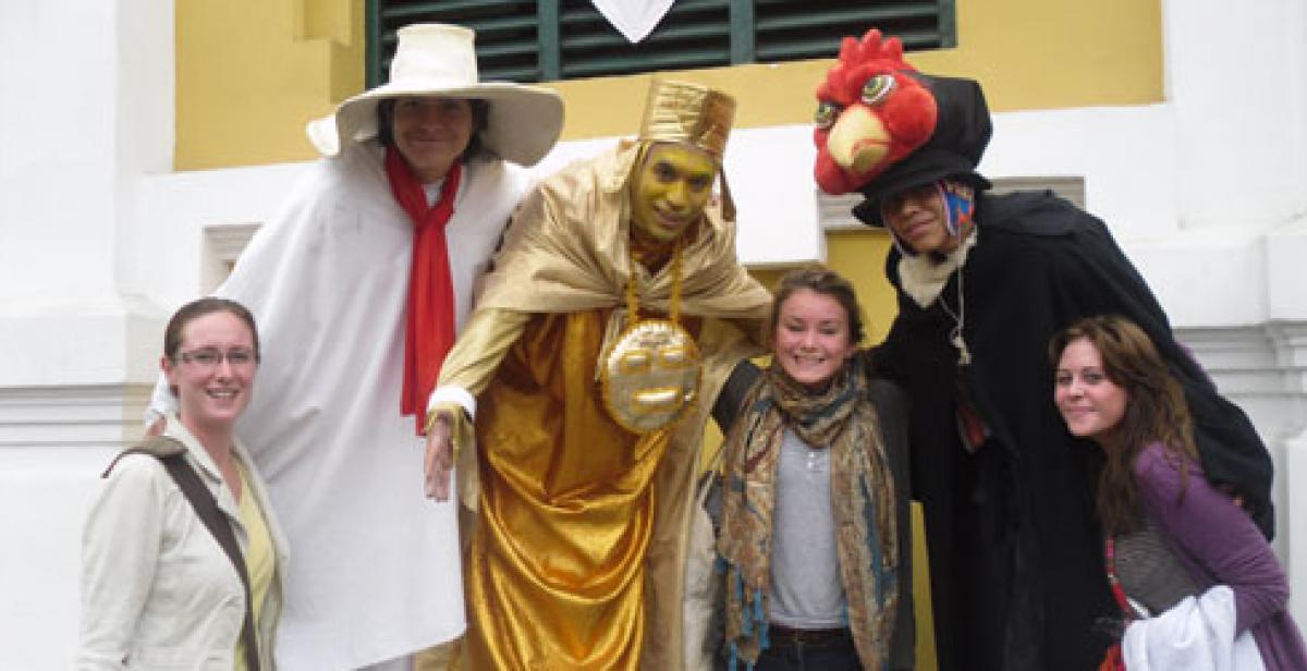 Empower volunteers with participants in a parade in Lima Peru