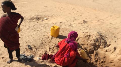 Women in a dried up river bed, Somaliland. Photo by Malou Schueller