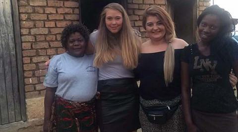 Kimberley and Abbe Smith with their host family