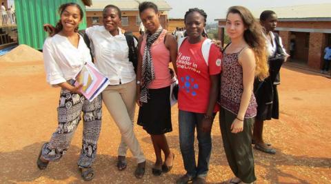 Volunteers Leah, Patricia, Tammie and Mphatso and Laura outside Masasa Secondary School following a successful peer education session