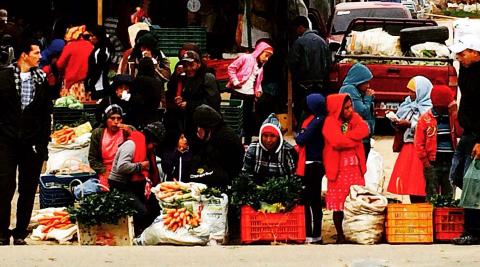 Honduran women selling produce at a market in La Esperanza