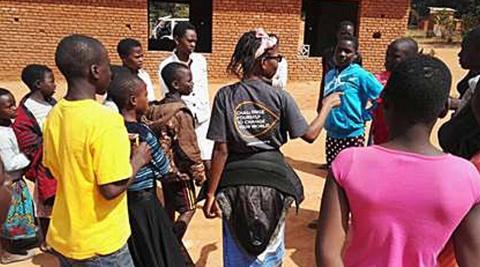 Volunteers from my team facilitating sexual health workshops in Malawi. (Photo by Kamilah McCarthy)